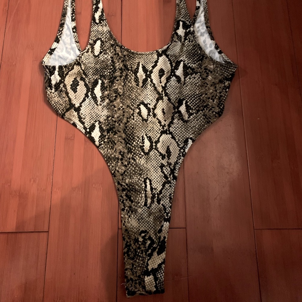Men’s one piece bodysuit swim in snakeskin!